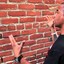 Man Talking to Wall